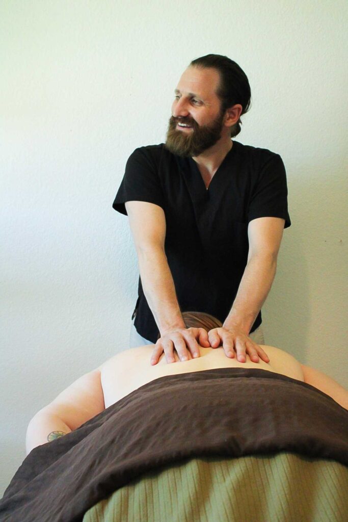 Trevor Andrews, owner of DATS Wellness Massage Therapist Denver, Colorado